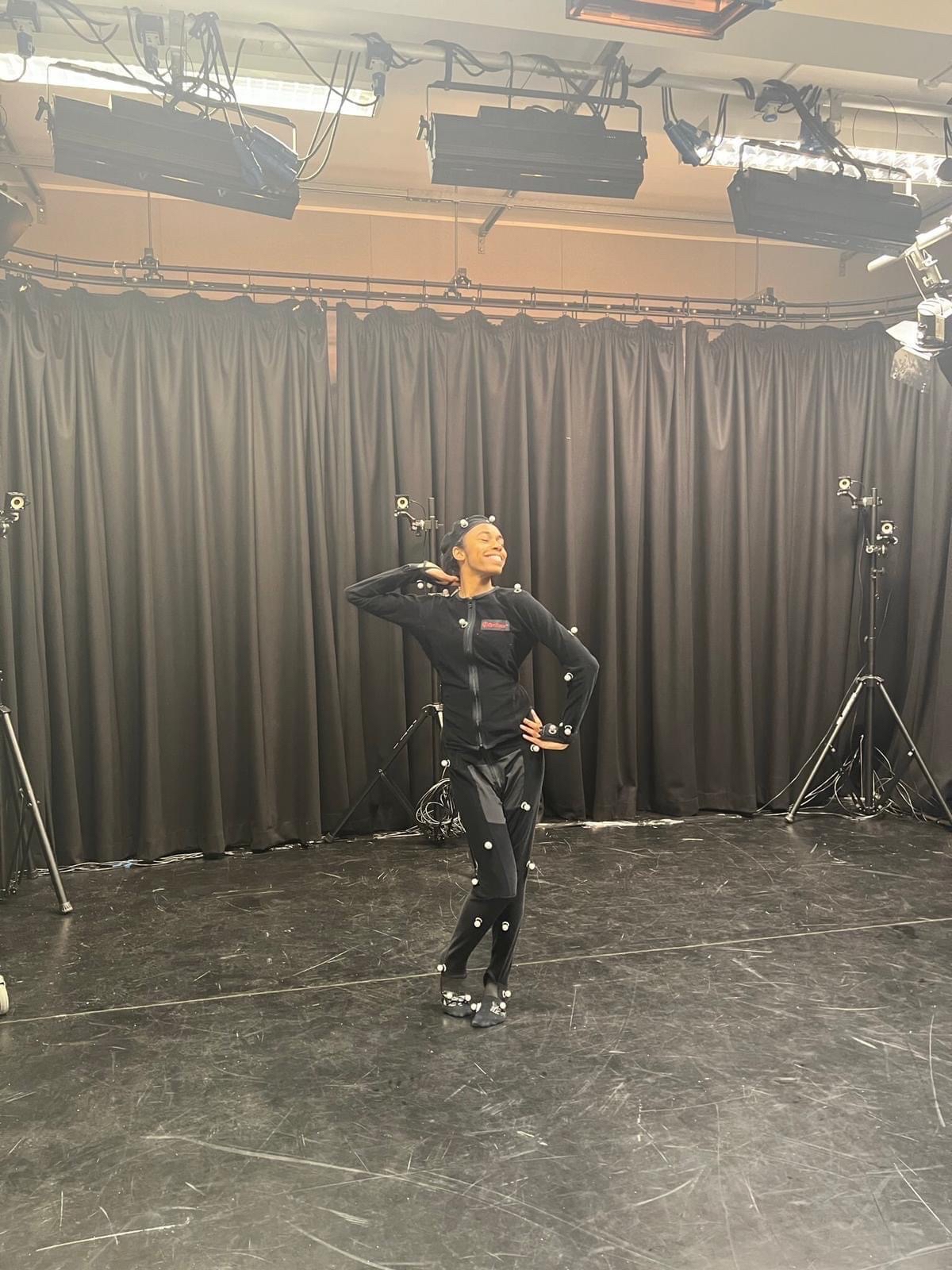 Linseigh Green wearing a motion-capture suit in Faust Shop motion capture session in the film studio at Anglia Ruskin University, Cambridge, photo by Annja Neumann.